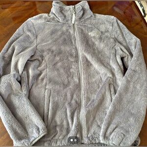 Women’s The North Face zip up jacket in grey. Size small.